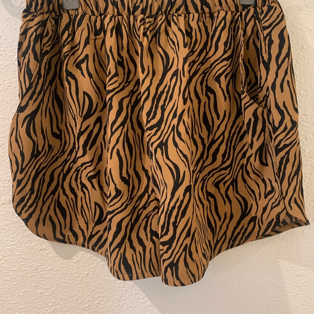 wearing size medium 

nami two piece set

shorts 

button up shirt